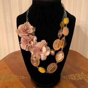 Unique blush pink floral and bead necklace. Flower has soft lining at back.